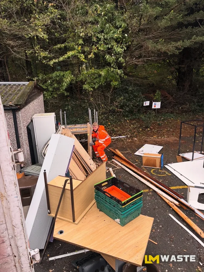 Furniture and cabinets carried out to the truck at a school clearance in Corringham
