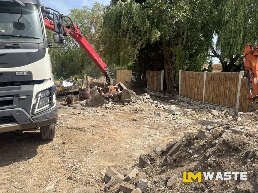 Our grab lorry clearing rubble and hardcore from a site