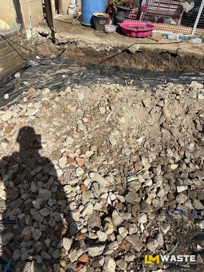 Rubble and hardcore from a knock-down, waiting for the grab