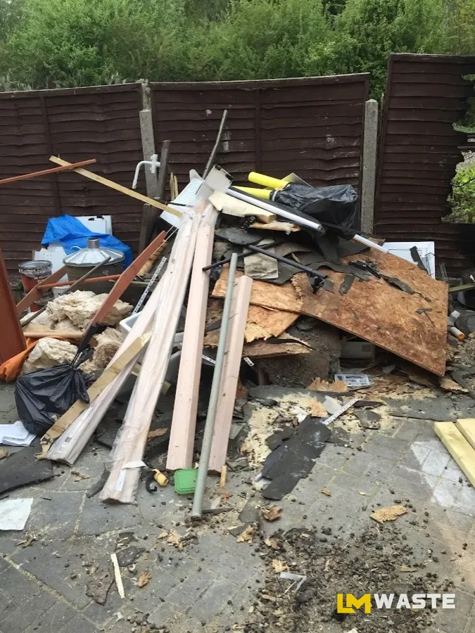 Dumped timber and rubbish before removal